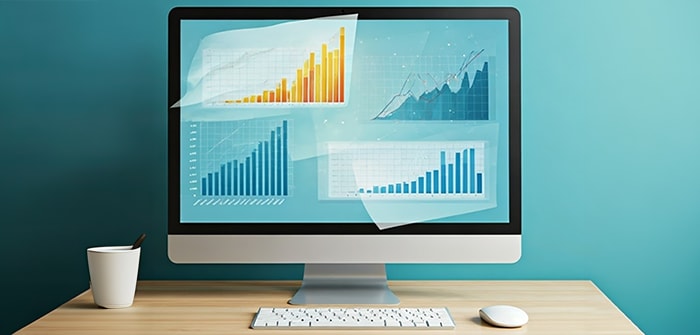 cartoon image of computer monitor with PDF charts peeling off the screen